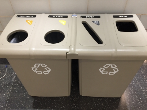 Bins with Cans/Plastics, Plastics, Paper, and Trash