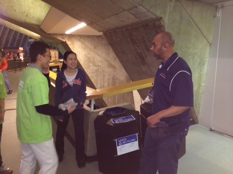 Volunteers explaining the importance of recycling