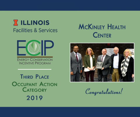 ECIP winners from McKinley Health Center accept their award plaque